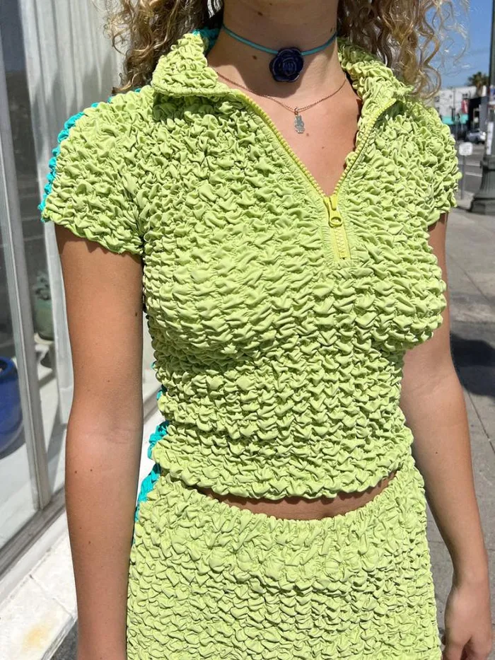 Tops Shop Lisa Says Gah Split Popcorn Polo