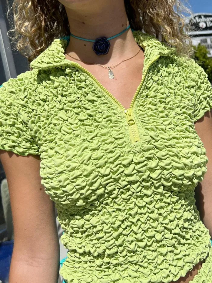 Tops Shop Lisa Says Gah Split Popcorn Polo